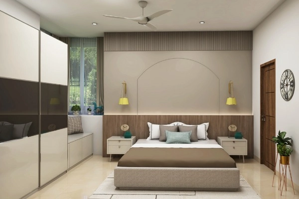 Interiors the floor to ceiling sliding wardrobe in earthy toned bedroom2